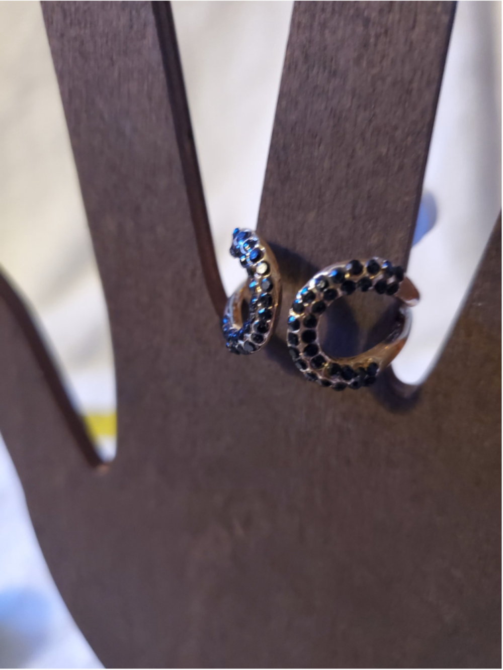 Blueish Blackish and Gold Tone Open Wrap Ring, what ever color it is. . Its cute